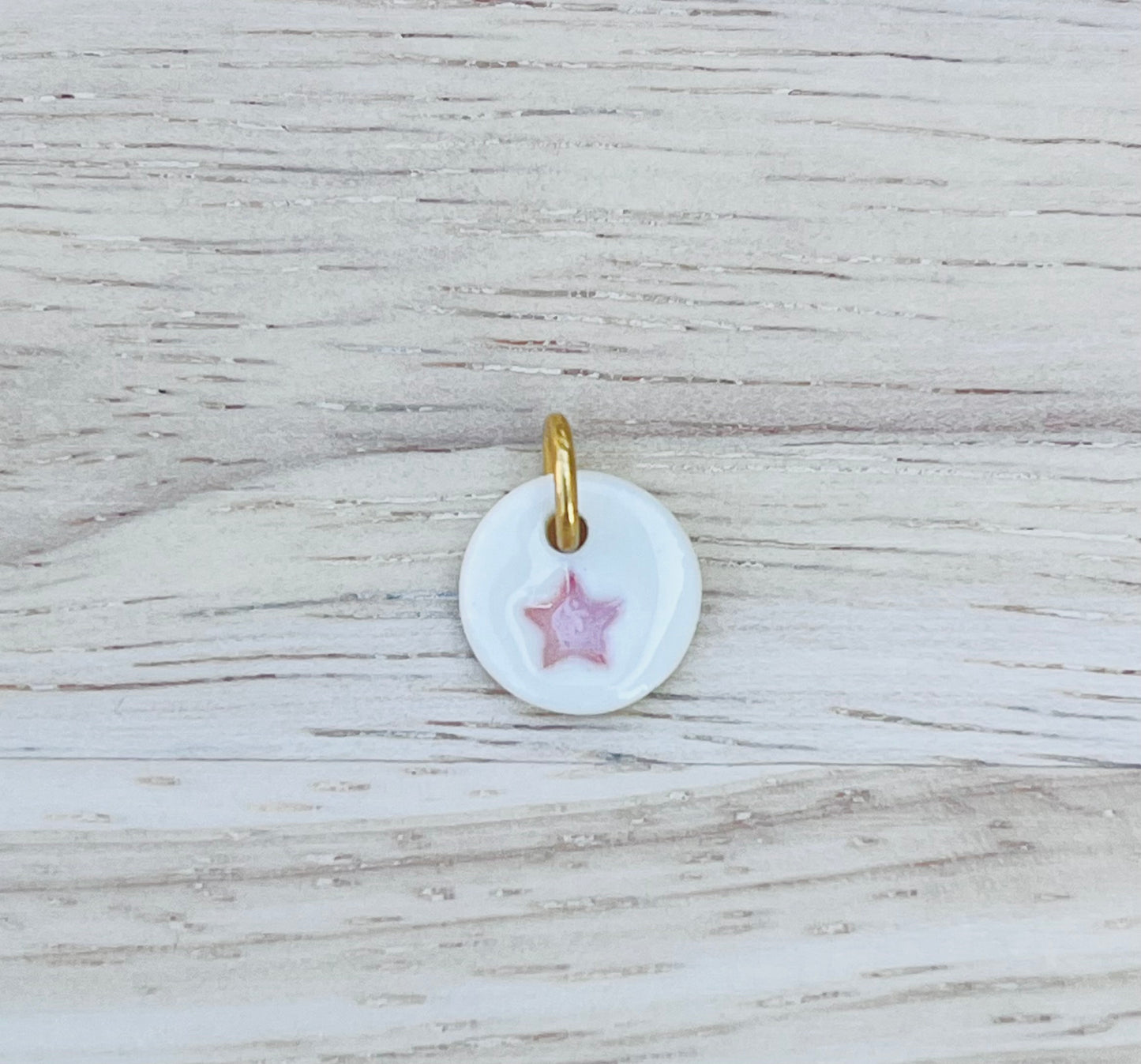 Pendentif étoilé rose pâle