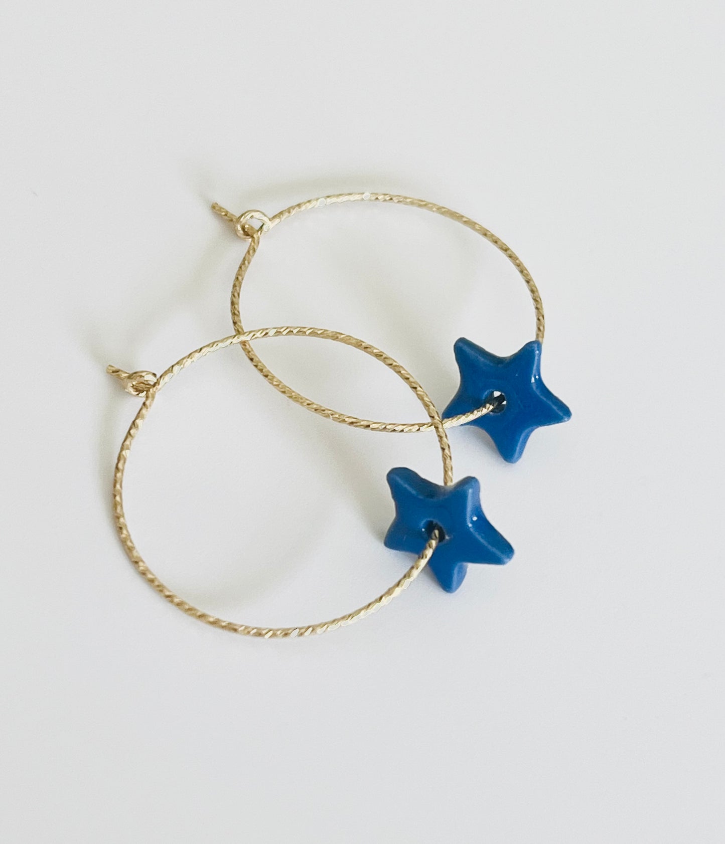 Boucles d'oreille étoiles bleues