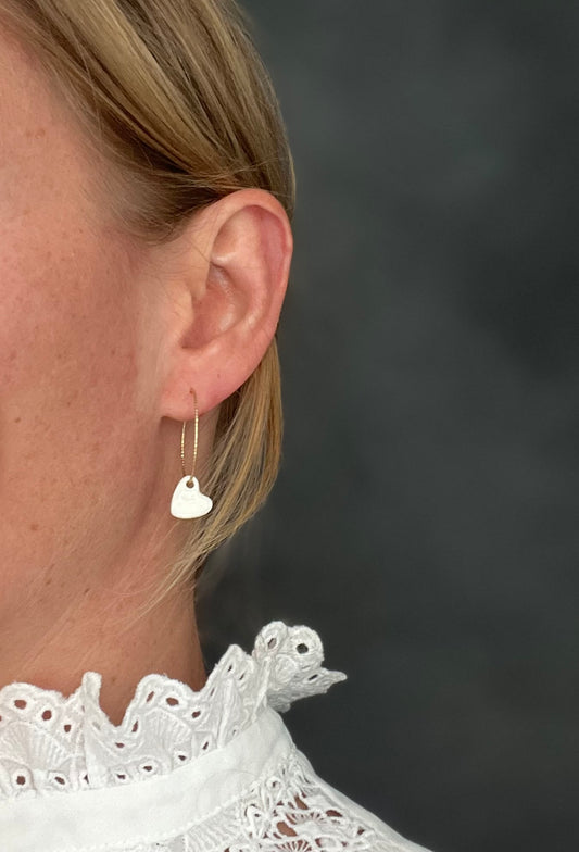 Boucles d'oreille coeur blanc