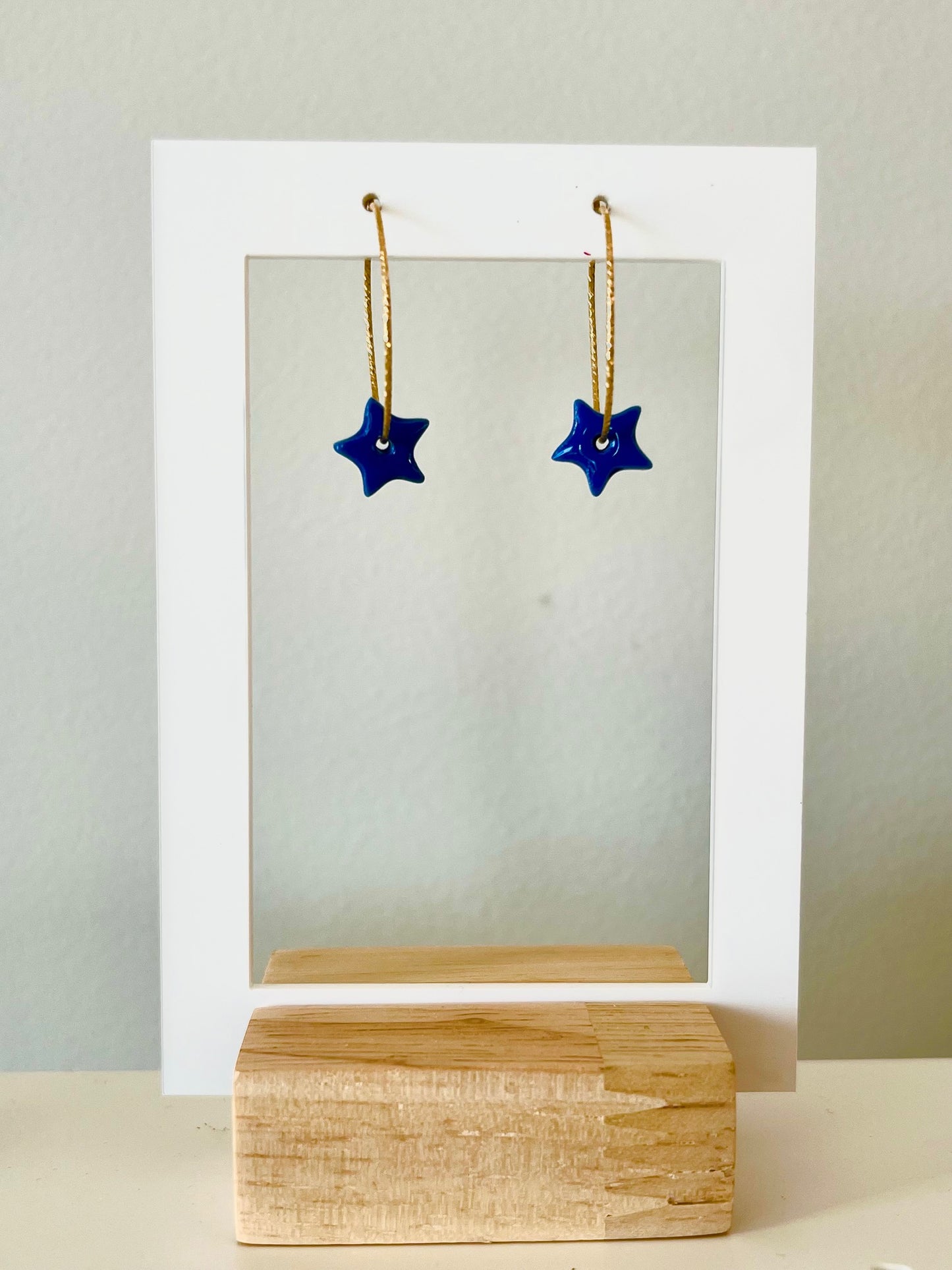 Boucles d'oreille étoiles bleues